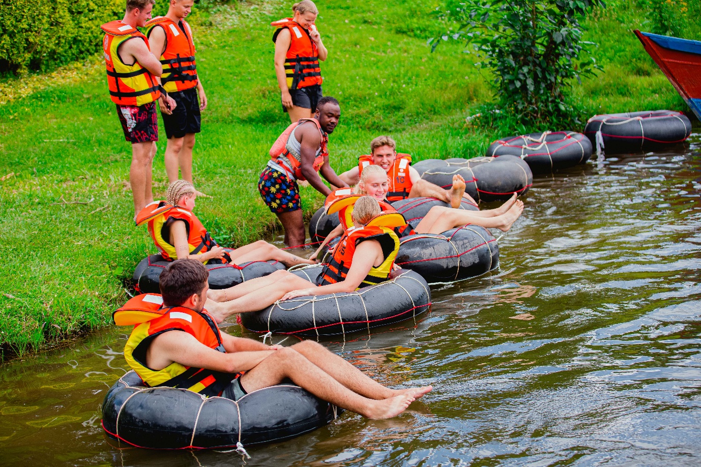 Group water tubing fun - Uganda lake adventure